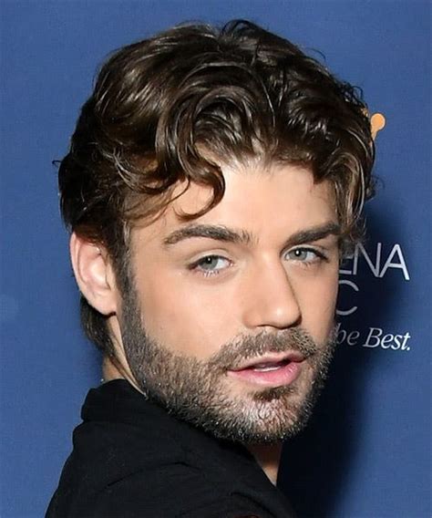 Garrett Clayton Short Wavy Black Hairstyle With Layered Bangs